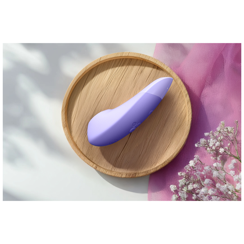 WOMANIZER - BEAUTY ESTIMULADOR DE CLÍTORIS POR SUCCIÓN 6 NIVELES LILA